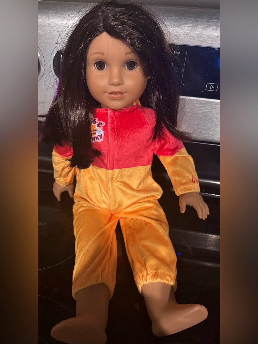 American Girl Doll in Red and yellow outfit